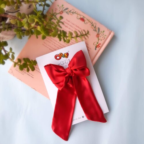 red pigtail bow