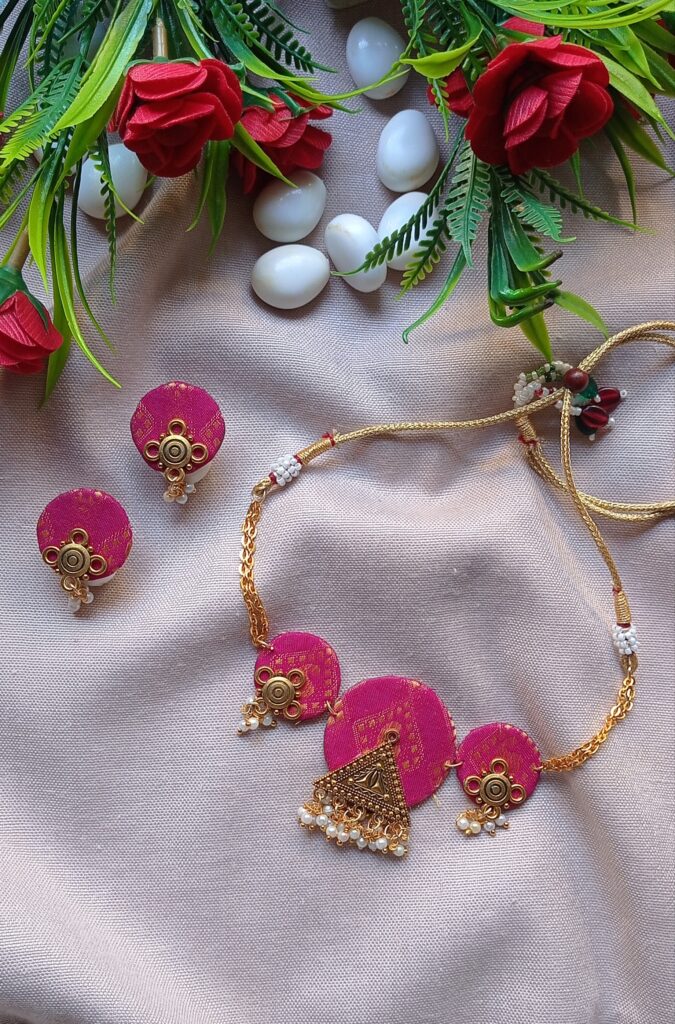 Handmade Fabric Necklace detailed with gold plated pendent , moti.