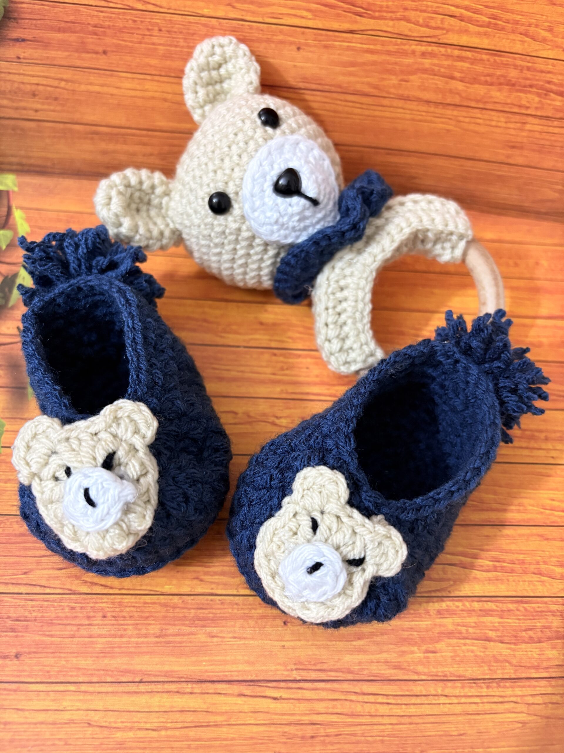 Crochet baby shoes and rattle set