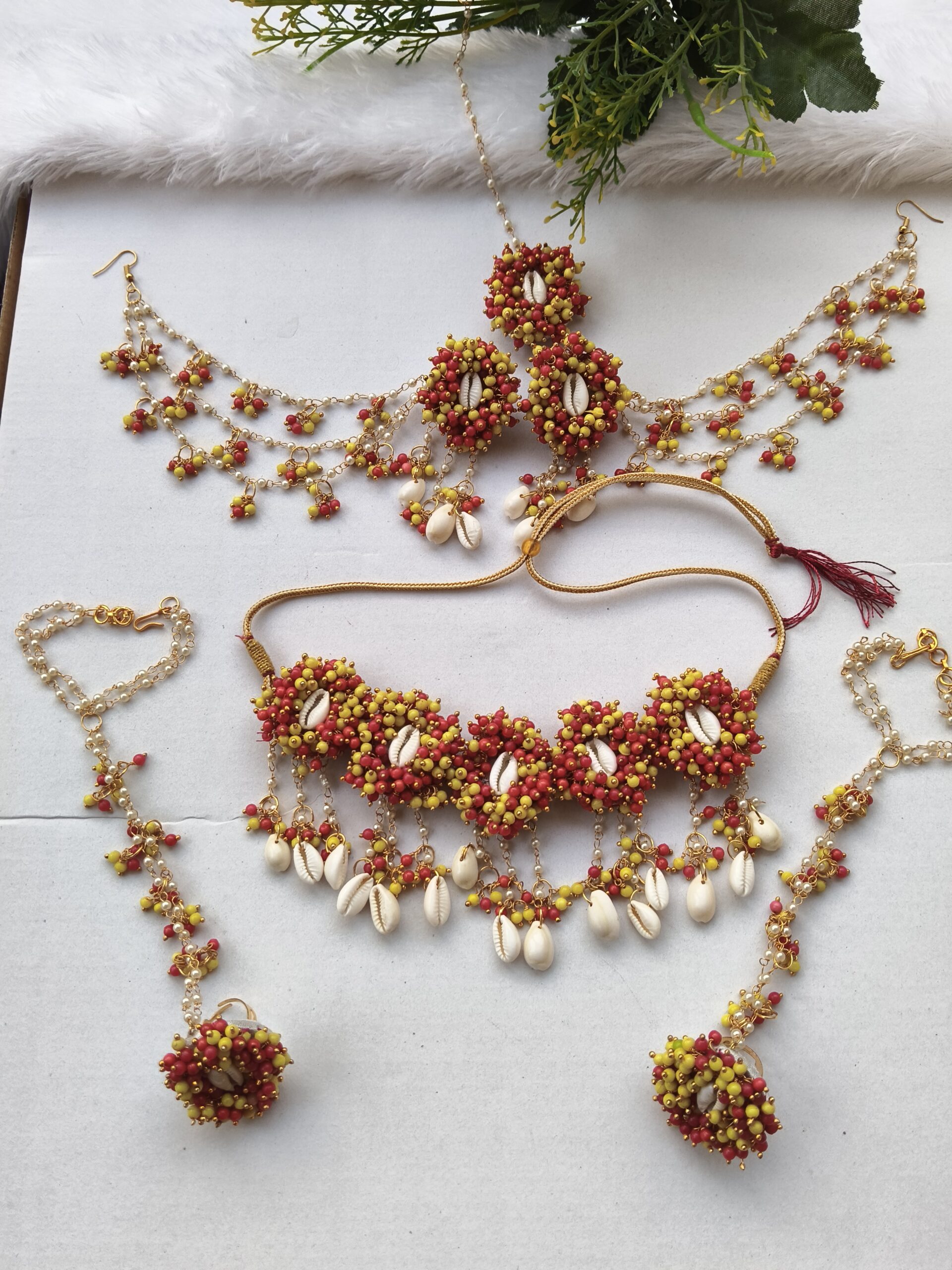 Handmade Surajmukhi haldi set in red yellow pearls with shells